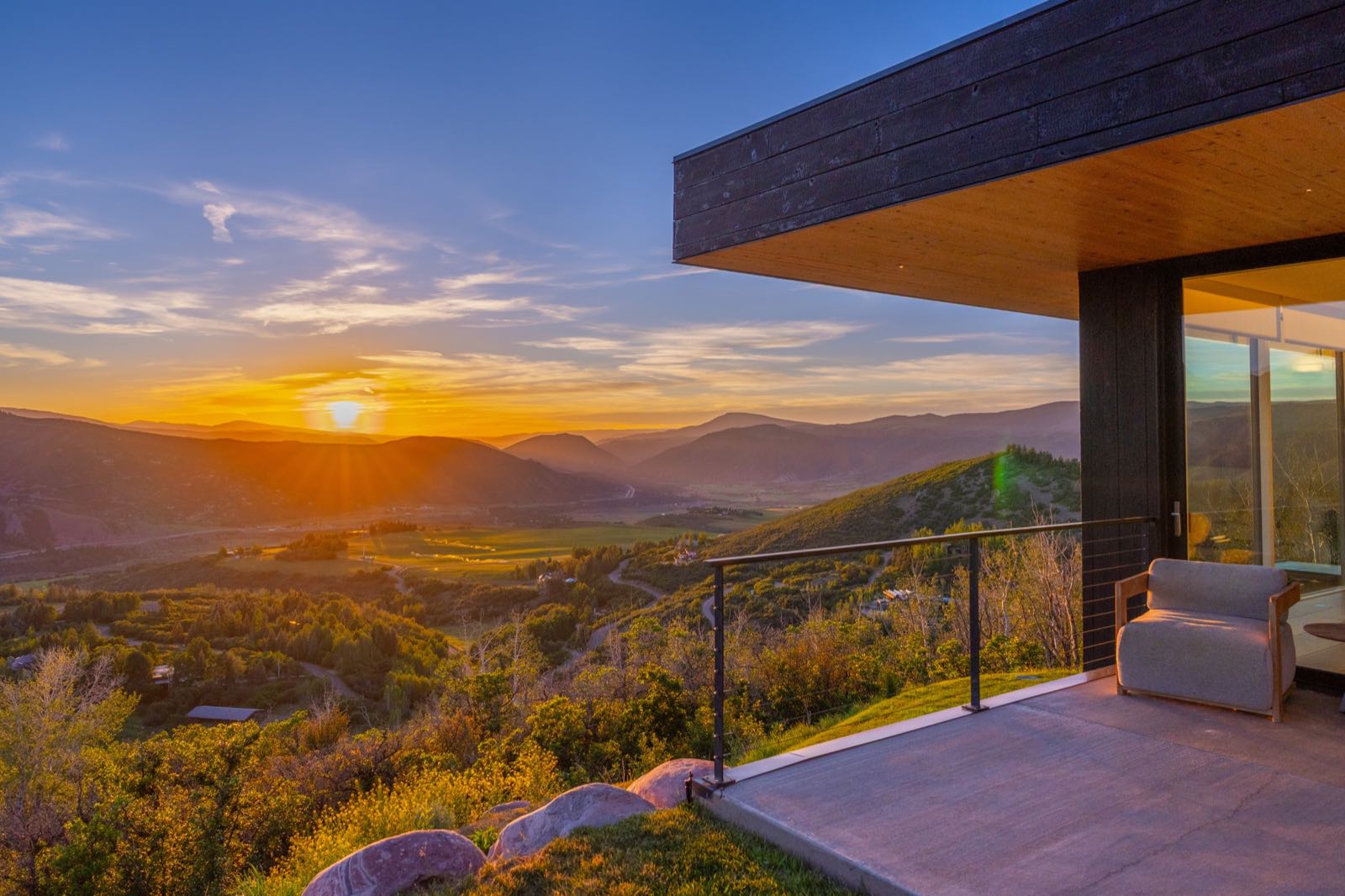 Covered terrace at sunset, overlooking the valley